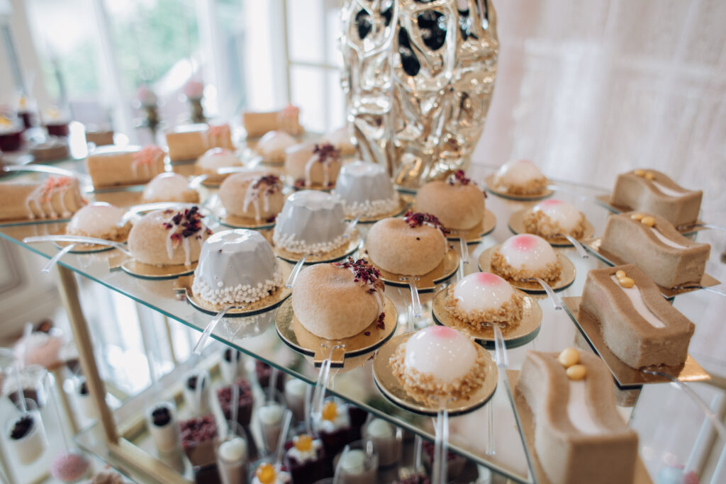 Trendy portion desserts on the candy bar close up